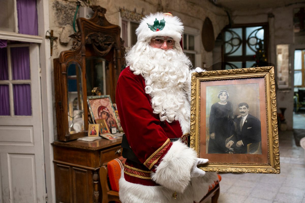 Kassissieh holds a photo of his great-grandparents.