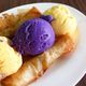 Keso ice cream sandwiching purple ube ice cream.
