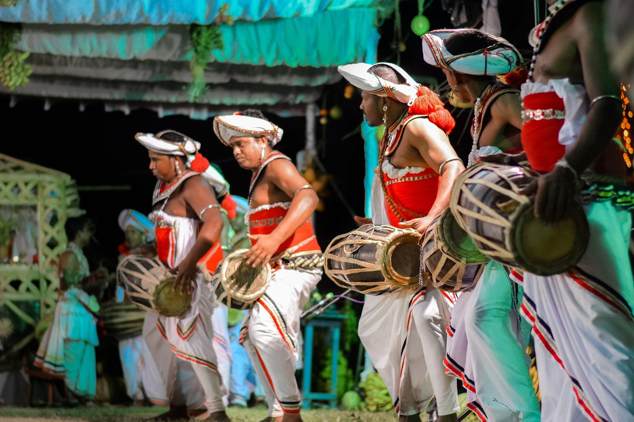 Drummers perform the <em>kohomba yak kankariya</em>, an ancient Sri Lankan dance said to banish the illness-causing spirit of a vengeful queen.