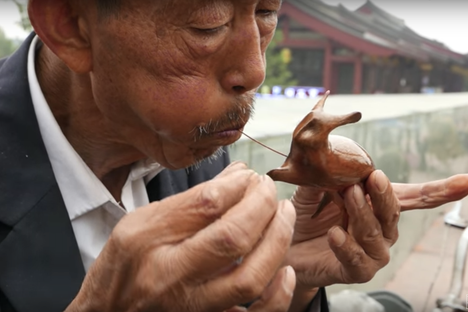 Watch a Man Turn a Lump of Hot Sugar Into a Bunny
