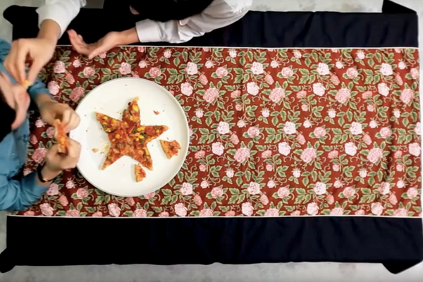 The finished, star-shaped pizza in one of Kim's 'Pizzas For the People' films.