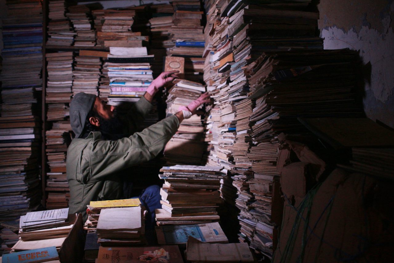 Hamzeh AlMaaytah in his bookstore's storage room.