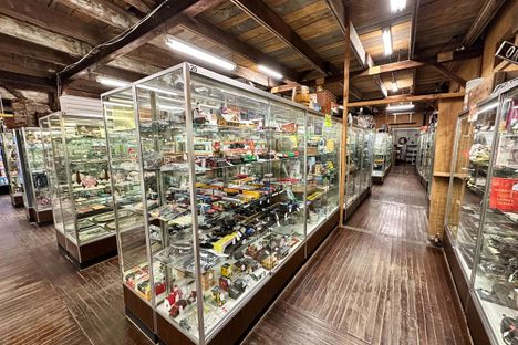 Glass cabinets in various areas hold potential treasures for visitors.