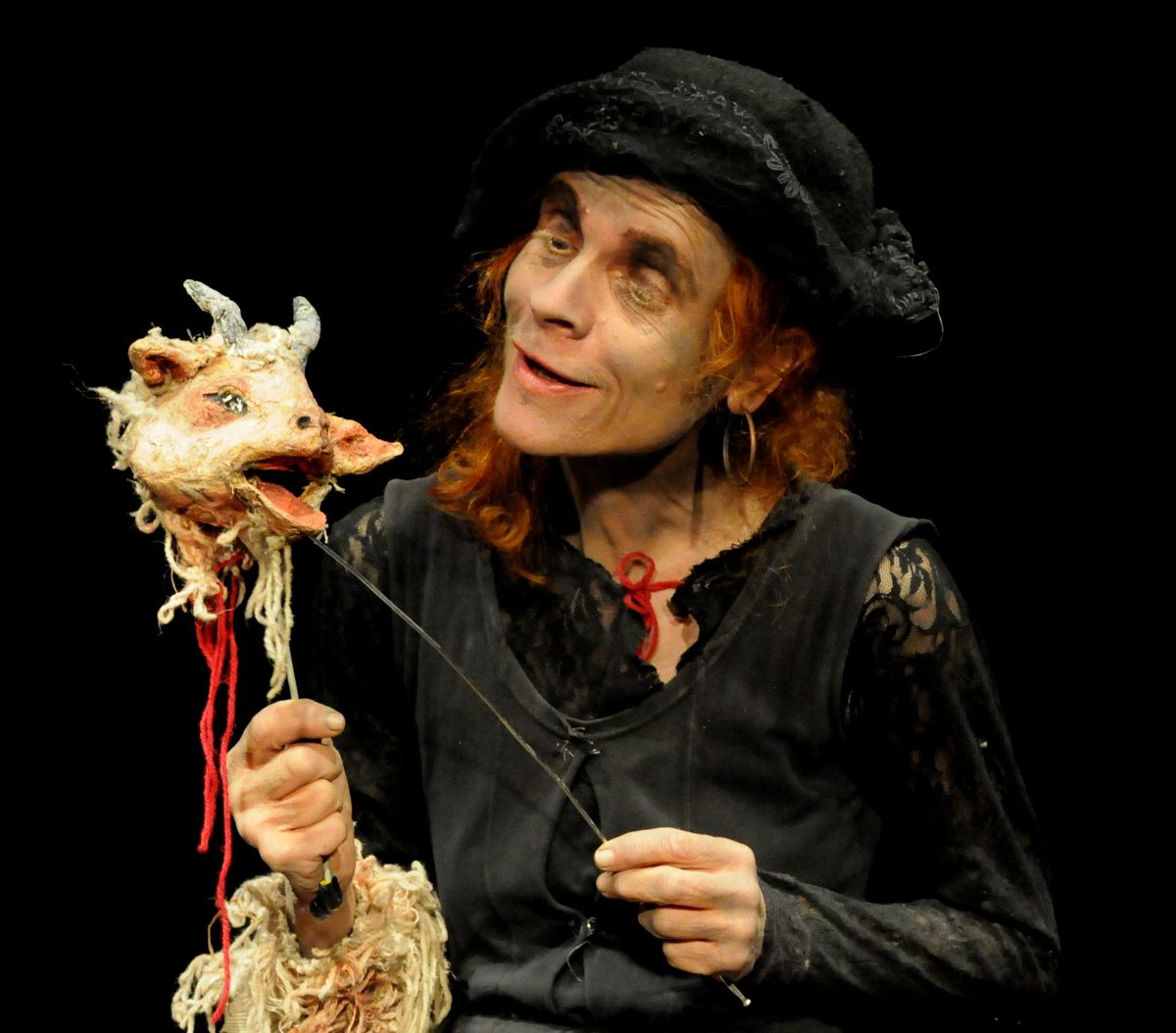 German puppeteer Ika Schönbein performing “Ricdin Ricdon," the story of a young woman who is locked in a dungeon by a king who hopes to turn her into gold.