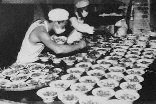 People hard at work in the People's Commune kitchen.