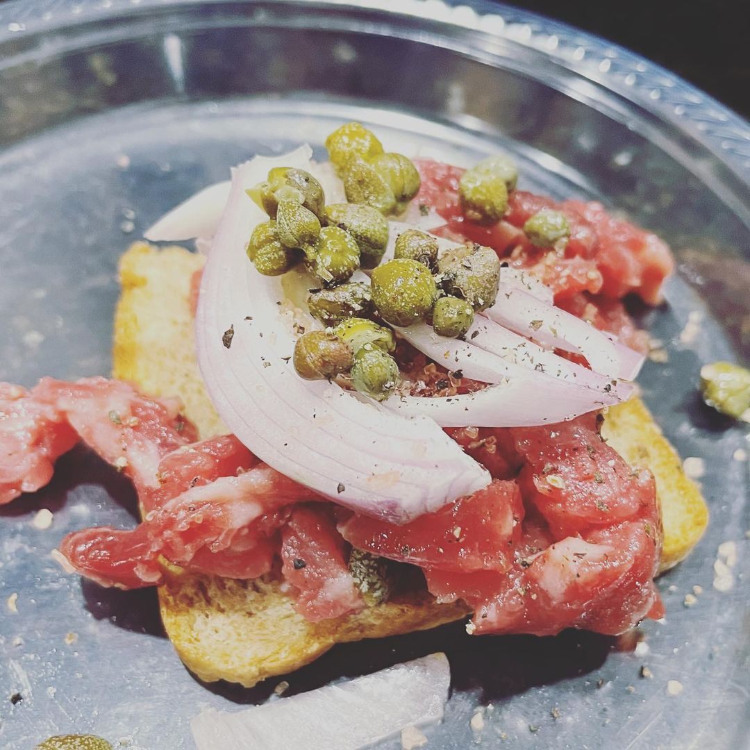This cannibal sandwich was enjoyed with a Tom & Jerry cocktail.