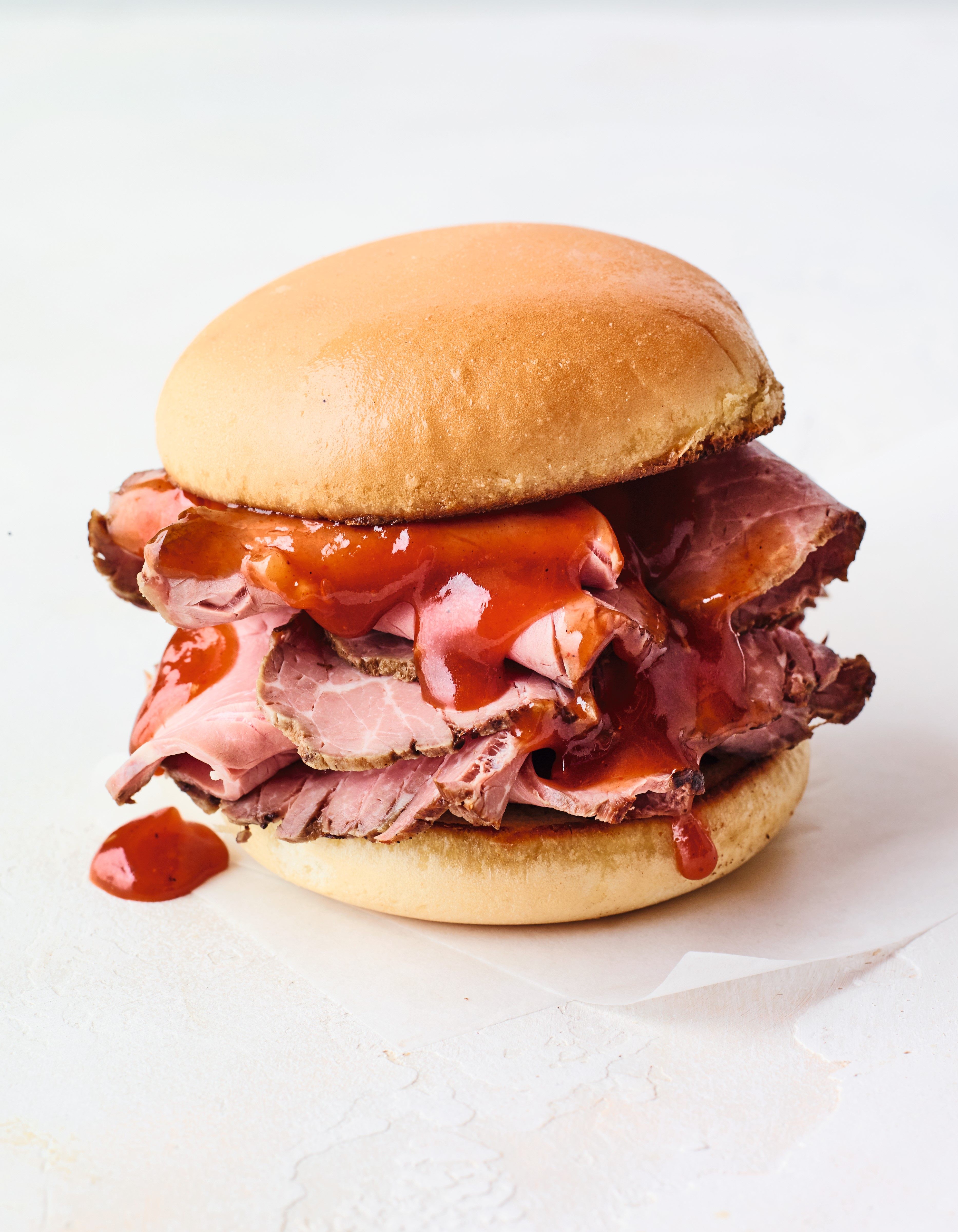 The BBQ beef sandwich comes piled high with thinly sliced meat.