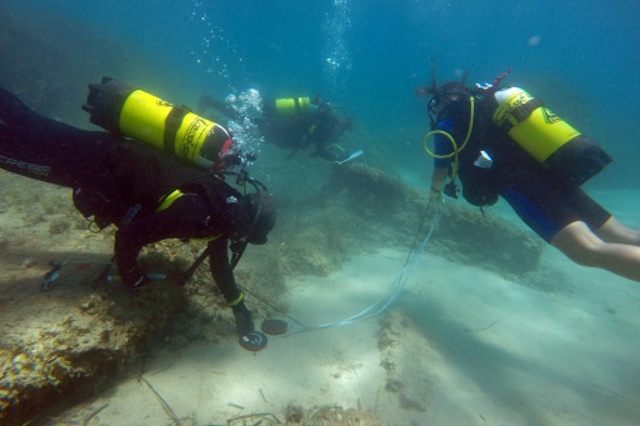 Divers exploring the lost city.