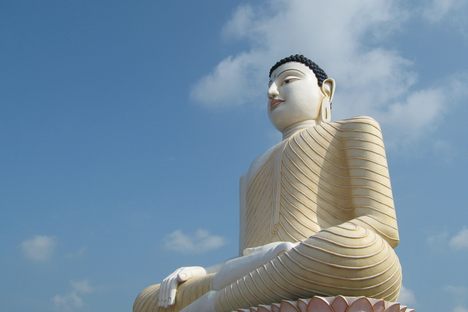 The giant Buddha looms over the pathway.