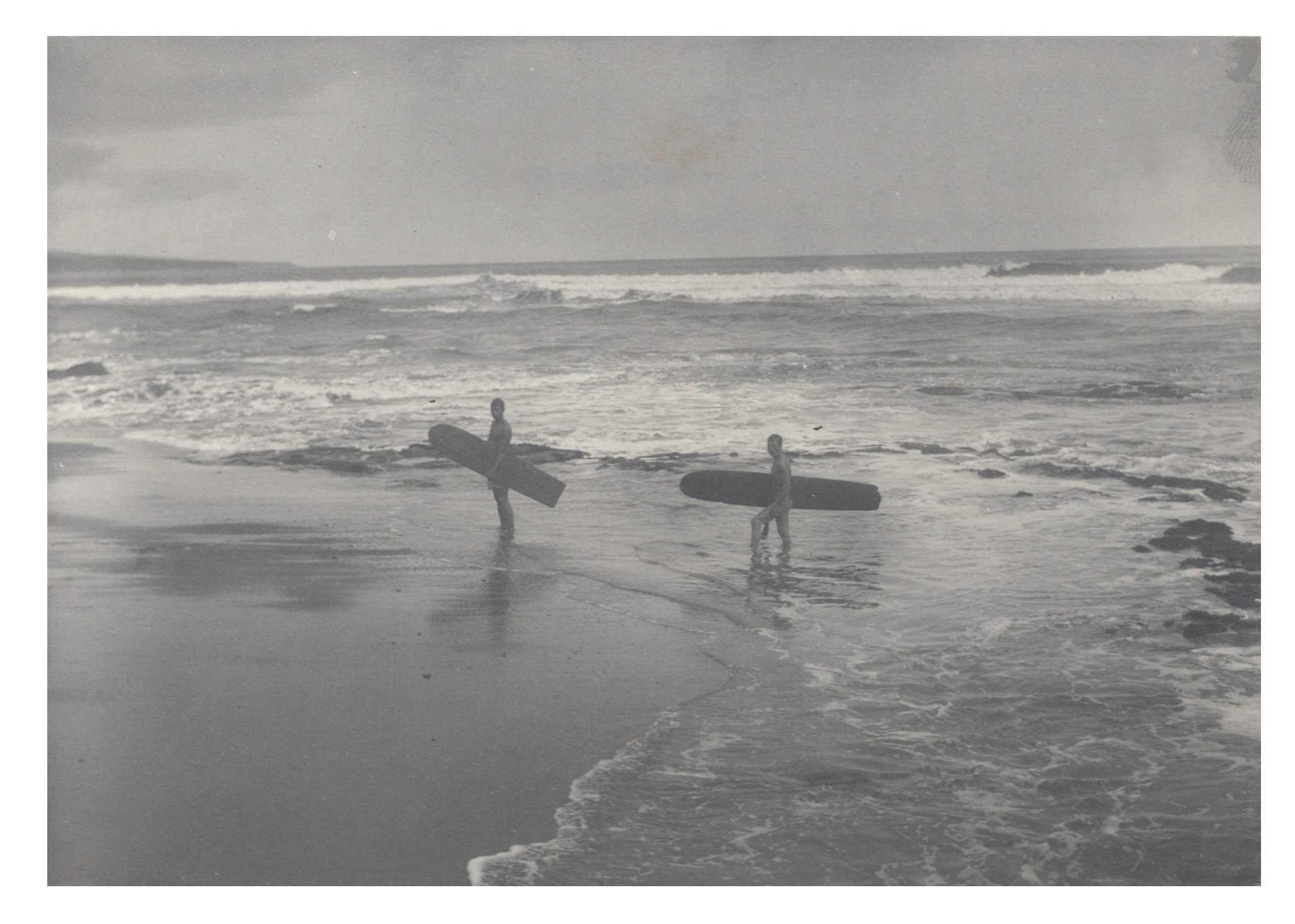 Surfers in the 1890s in Hilo Bay.