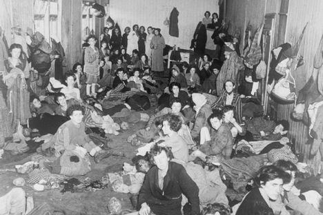 Liberation of Belsen Concentration Camp April 1945: Women and children herded together in one of the camp huts
