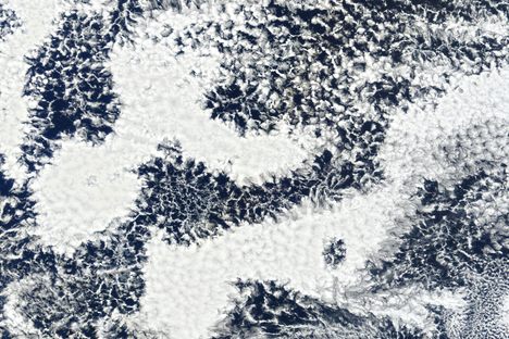 NASA satellites captured this ephemeral moment as open- and closed-cell marine stratocumulus clouds formed and dispersed over the Pacific Ocean, 1,000 miles west of Chile, in August 2022.