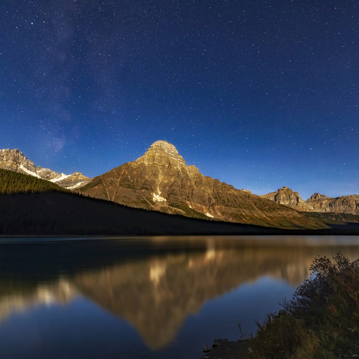 Mount Cephron catches the moonlight in Banff National Park.