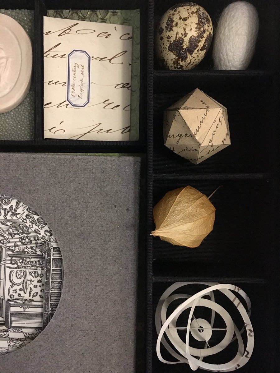 A small cabinet of curiosities curated by Cushing.