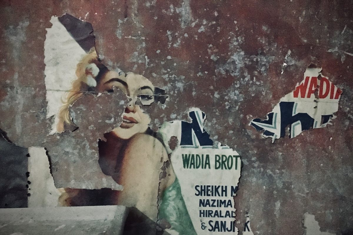 The remains of an original Wadia Brothers movie poster in the basement of Ganga Theatre in Bikaner.