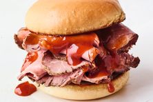 The BBQ beef sandwich comes piled high with thinly sliced meat.