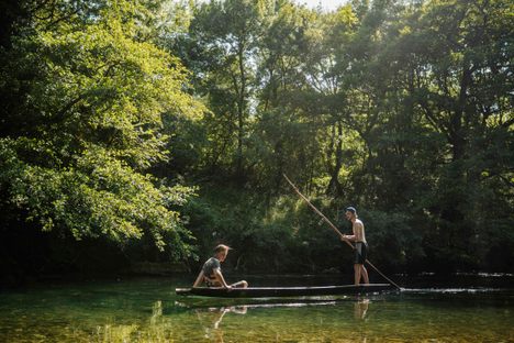 Taking a négo chin out on the cold, shallow waters of the Sorgues River offers respite from the Provençal summer's heat—nearly forgotten, the traditional wooden boats are enjoying a revival.