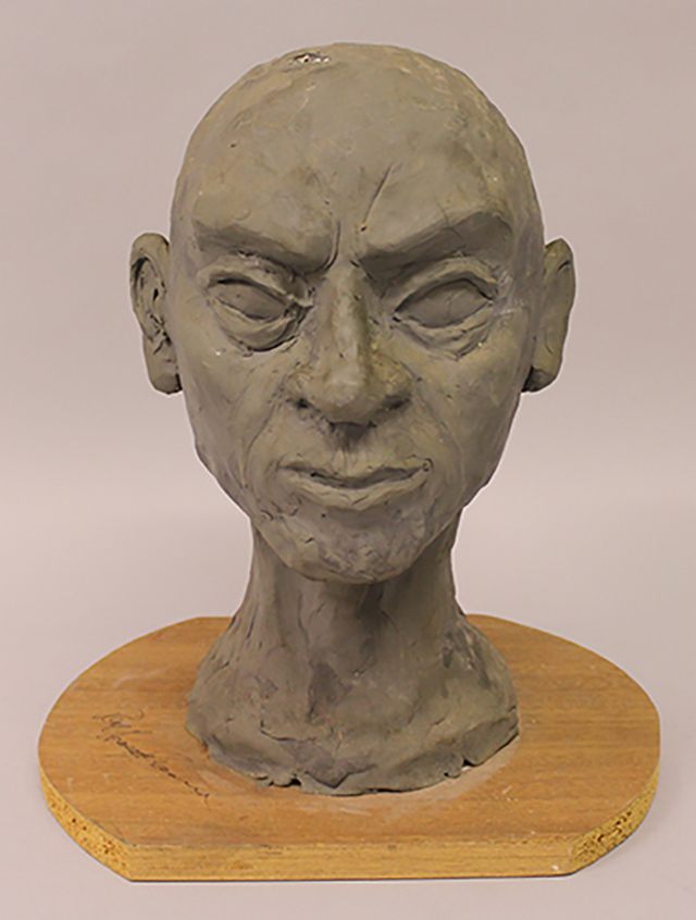 A painted papier mache bust on chipboard base, signed Ray Harryhausen in ink, 12” high               £50 – 100