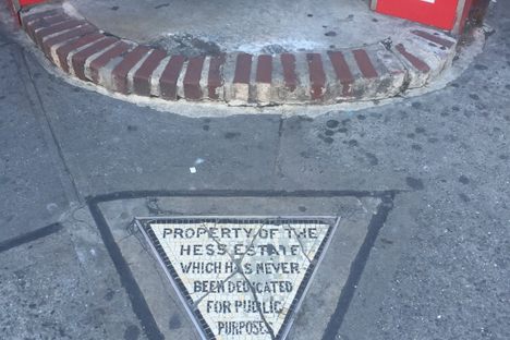 Stand on the tiniest, angriest piece of private property in the city.