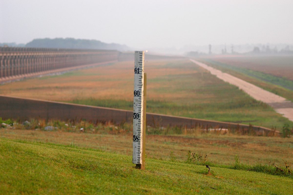 A measuring stick near the Morganza Spillway keeps tabs on how high the waters rise.
