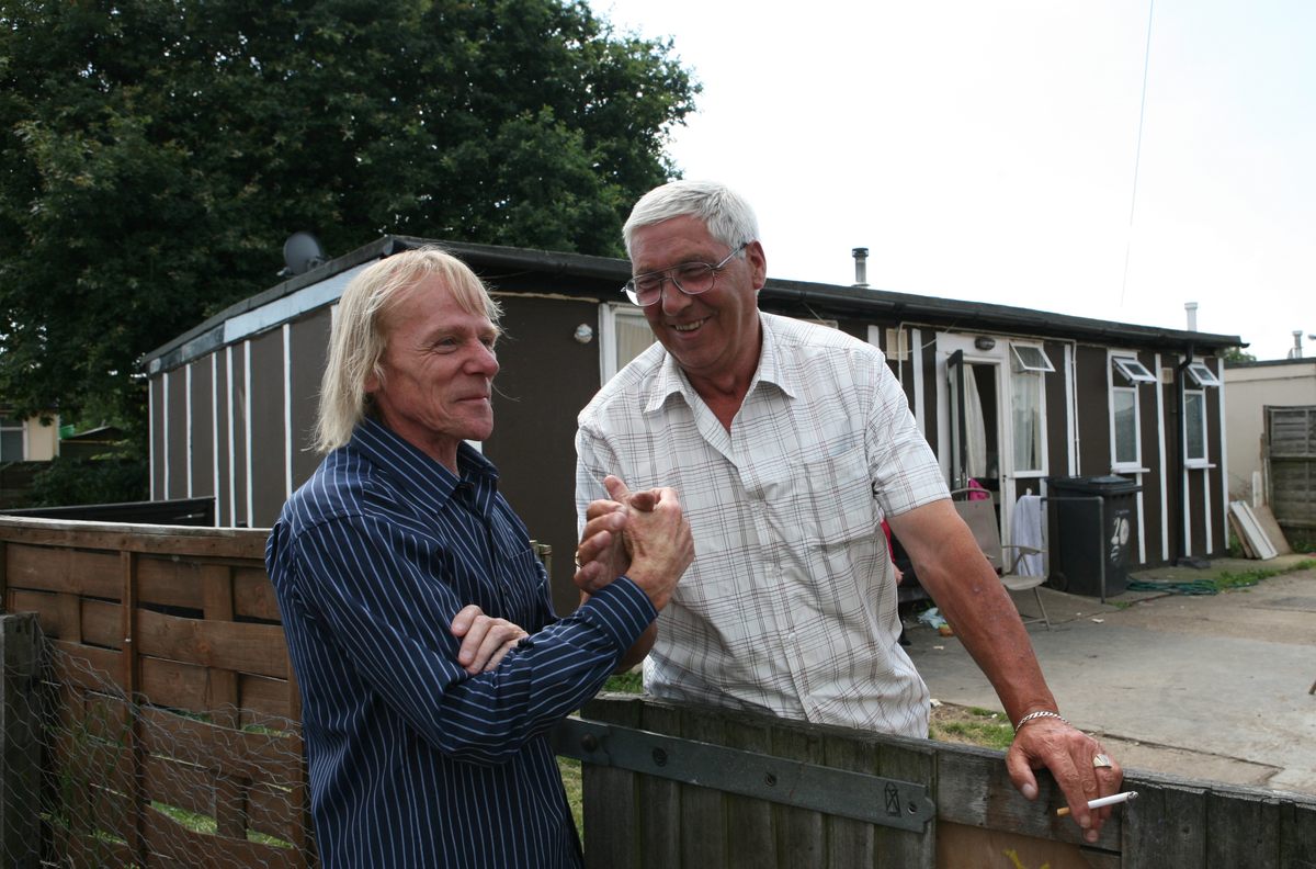Jim Blackender with a neighbour, Excalibur Estate, 2009.