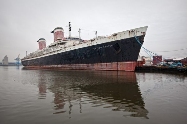 The SS United States moored in Philadelphia in 2008. The grand ocean liner's fate has been the subject of years of debate.