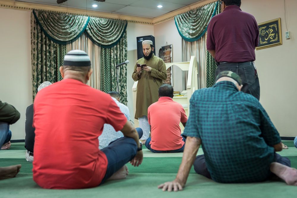 Imam Mohammed leads Friday prayers at the mosque in San Pedro Sula.