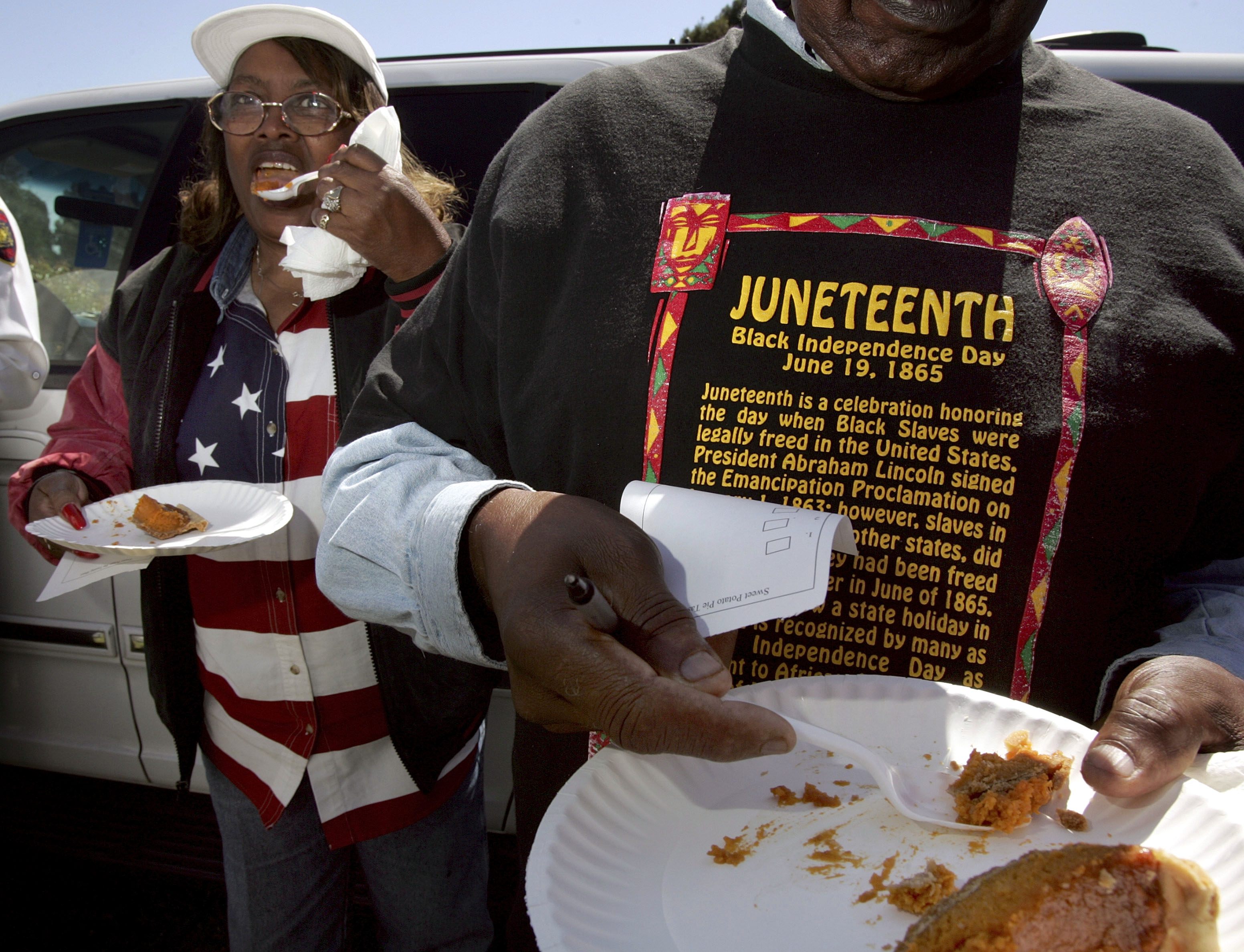 Participants enjoying sweet potato pie at a Juneteenth cook-off contest in Richmond, California.