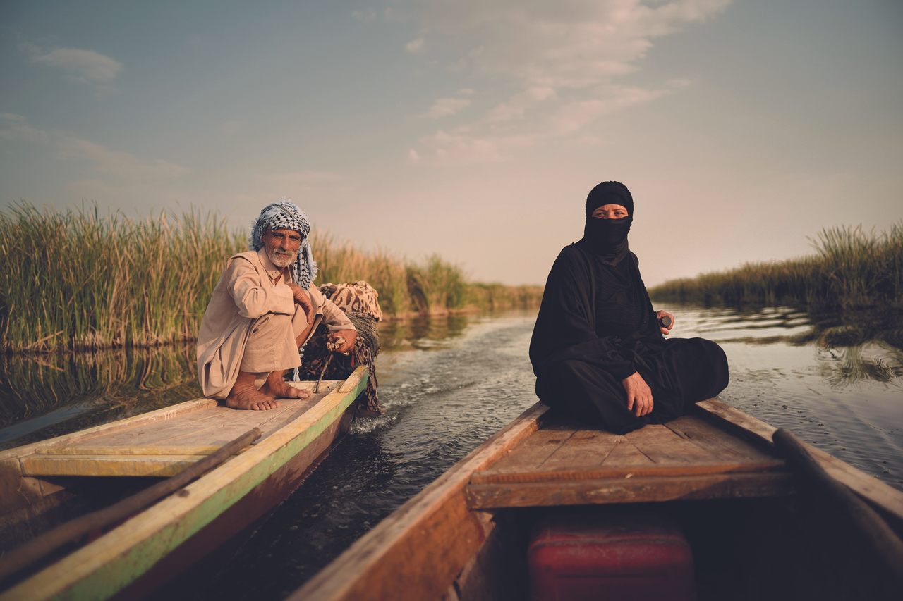 Abu Haider, a famed Marsh Arab guide, and his wife, Um Haider, in the Central Marshes of Iraq. 