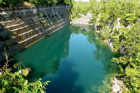 The sheer walls and striking blue water of the Empire Quarry have dazzled visitors for decades.