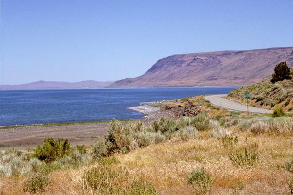 Lake Abert from the south.  The highway is US 395.  Abert Rim on the skyline.