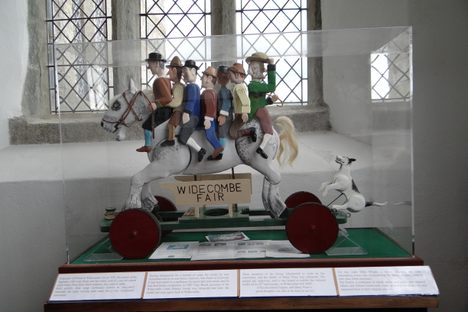The gray horse and its riders.