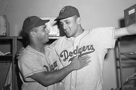 Roy Campanella and Don Newcombe after a victory for their major league team, the Brooklyn Dodgers, in 1949.