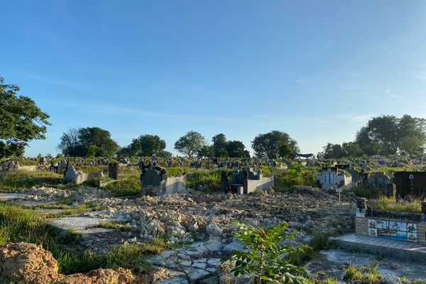 At Choa Chu Kang Cemetery, intact graves sit alongside demolished ones.