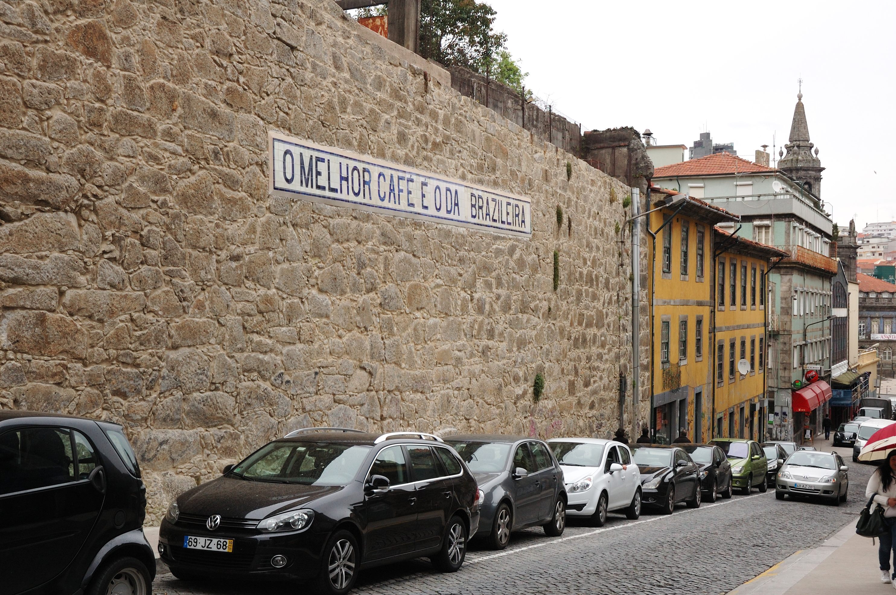 The Bank restored this historic advertising mural, which is a neighborhood landmark in Porto.