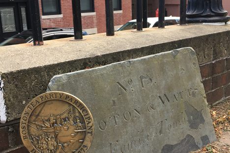 Gold markers pay tribute to participants of Boston Tea Party