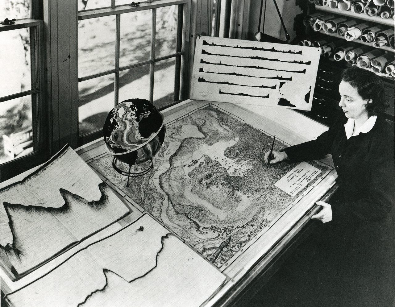 Tharp working on an early map of the seafloor.
