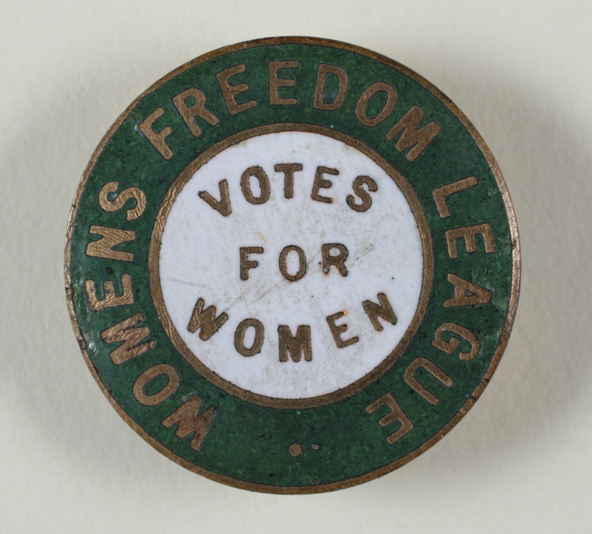 The colors of the WSL, as on this badge, were green, gold, and white.