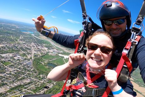 Macy skydiving in (above) Ohio.