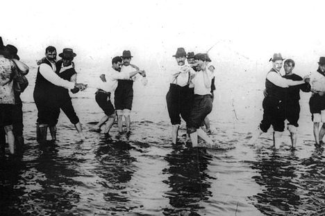 Working-class men dancing tango in Rio de la Plata in 1904.