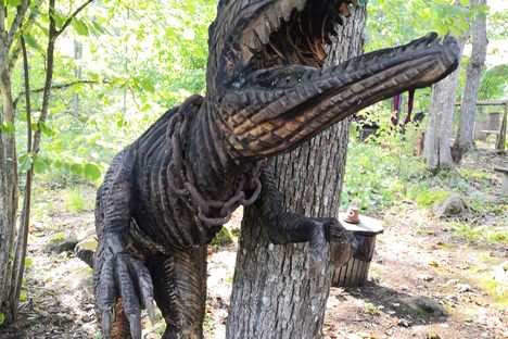 The wooden dinosaur at the start of the sculpture path.