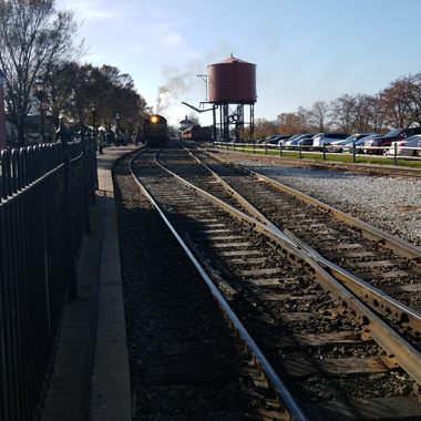 Looking west down the tracks toward the station. with another locomotive..
