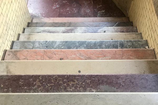 The colorful stairs were installed to refresh the formerly seedy staircase.