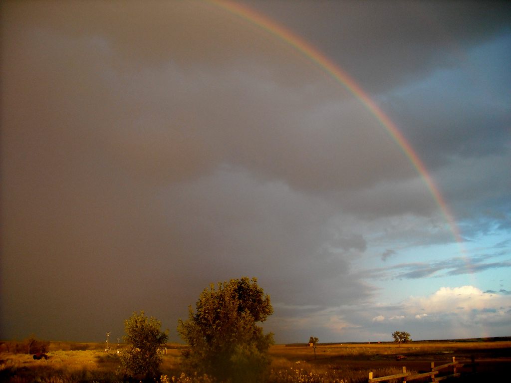 A rainbow appears over North Dakota's badlands. 