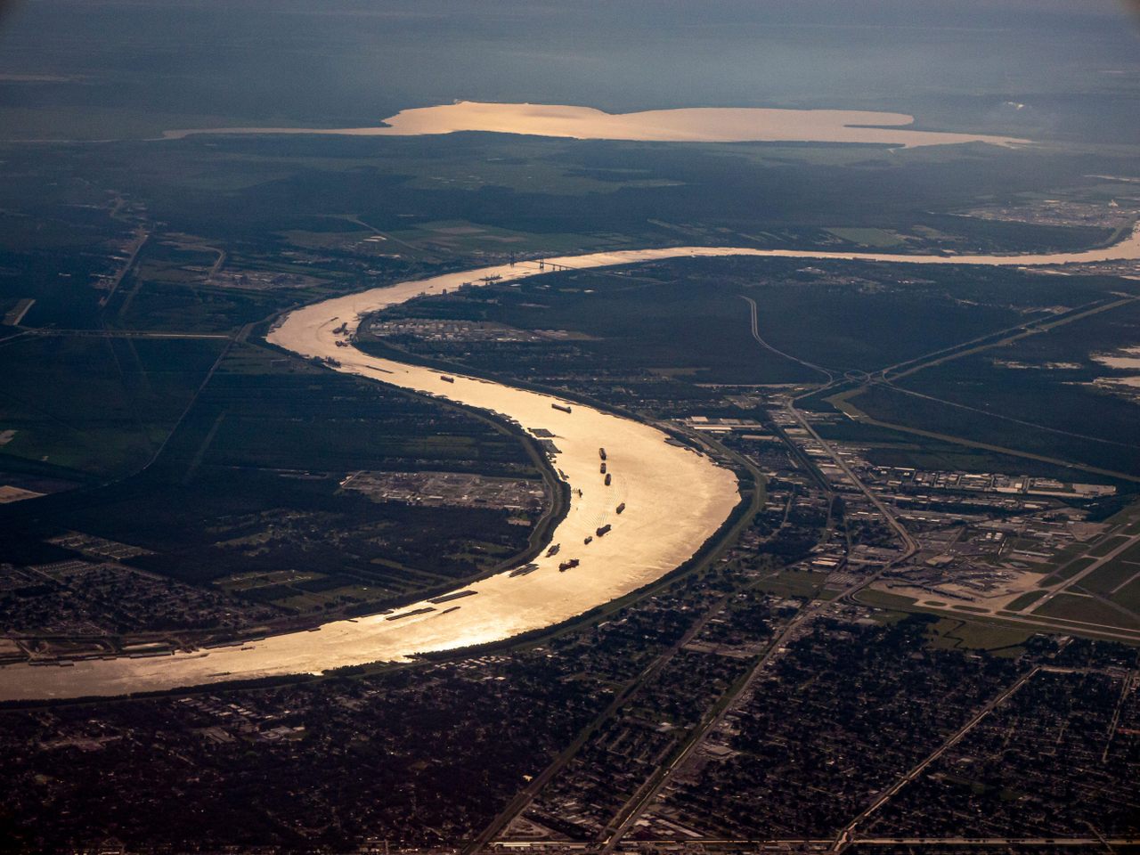 Boats and other river traffic follow the Mississippi's curves near New Orleans; the mighty river is part of The Great Loop, a 6,000-mile circle around the Eastern United States.