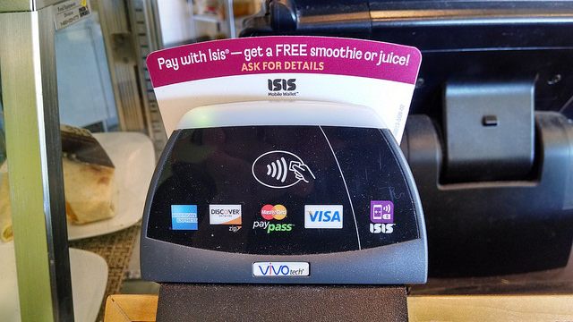 A sign for Isis Mobile Wallet.