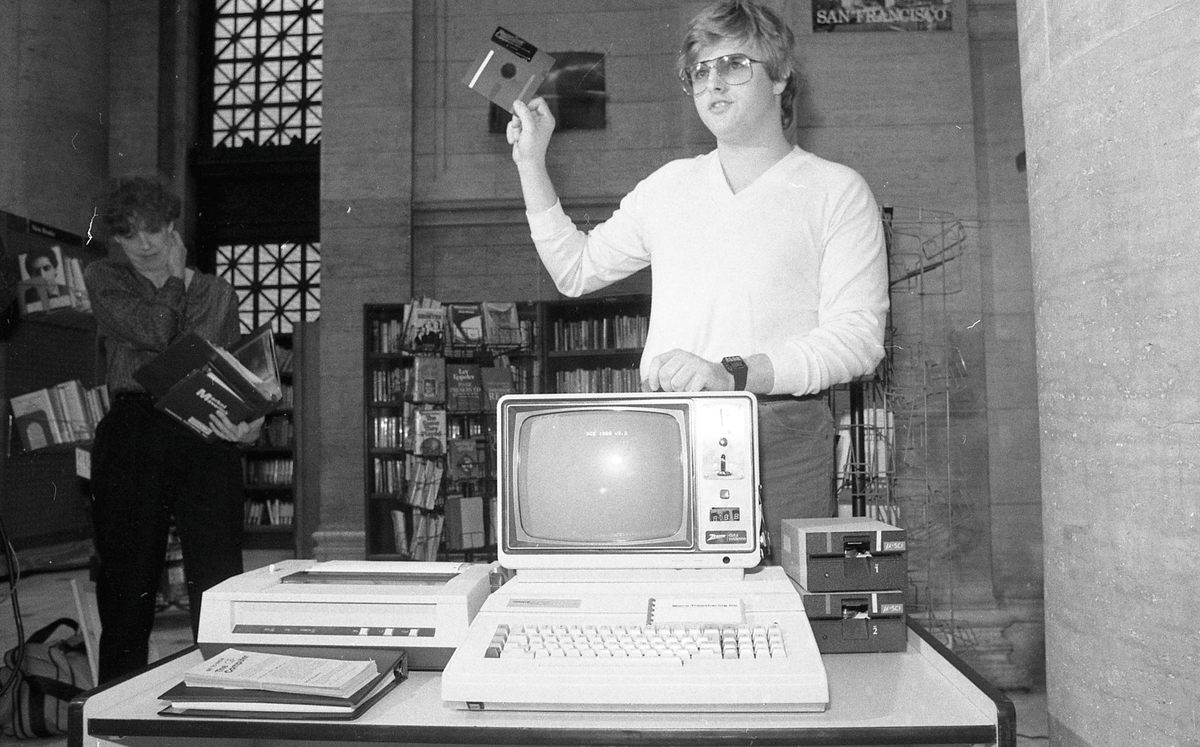 January 8, 1983: The first computer at the San Francisco Public Library was coin-operated and cost $1 for 20 minutes. With the computer is the mastermind behind the project, 18-year-old Salinas resident Kim Cohan.
