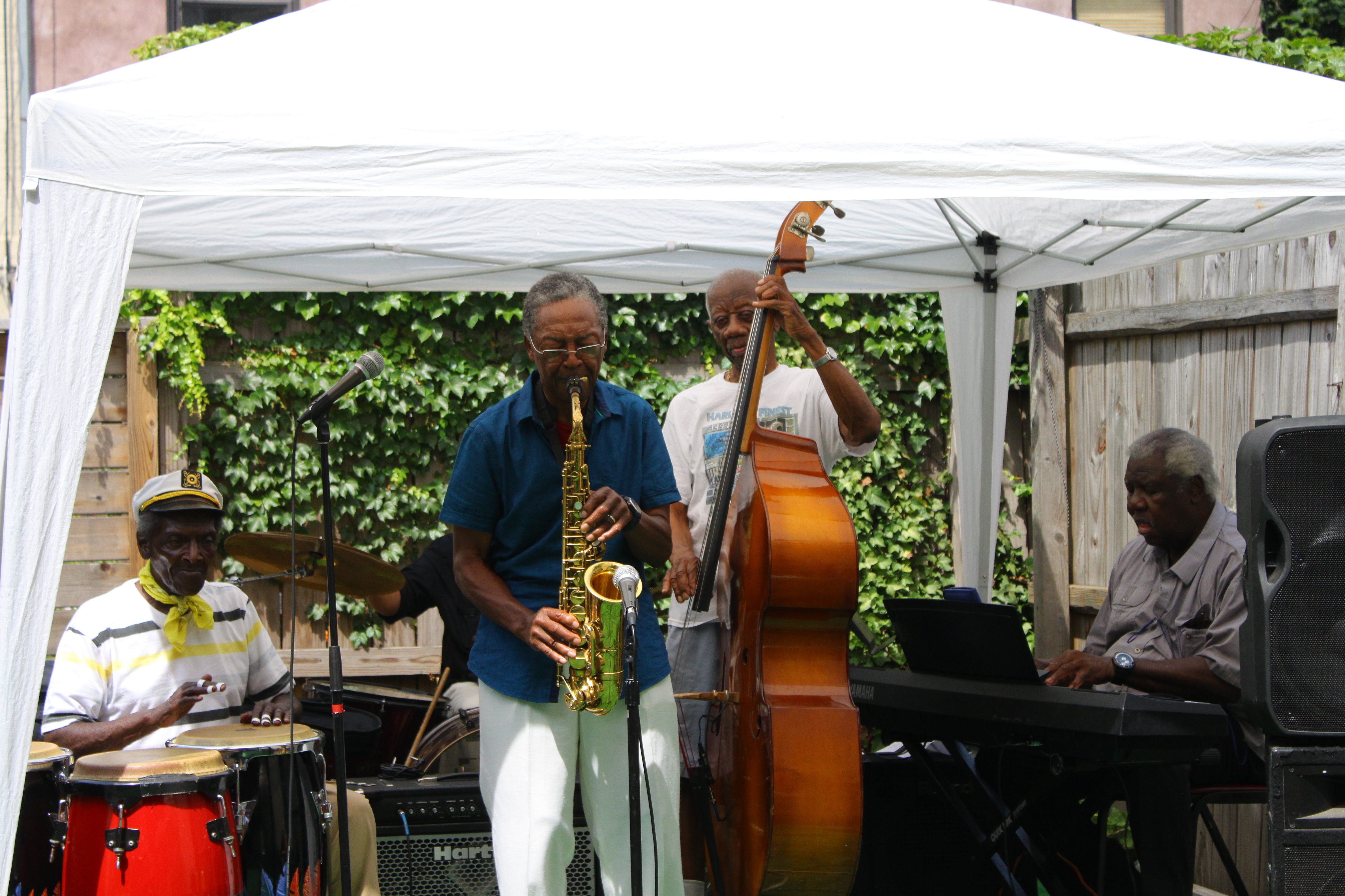 Chairman Willie Mack plays the sax