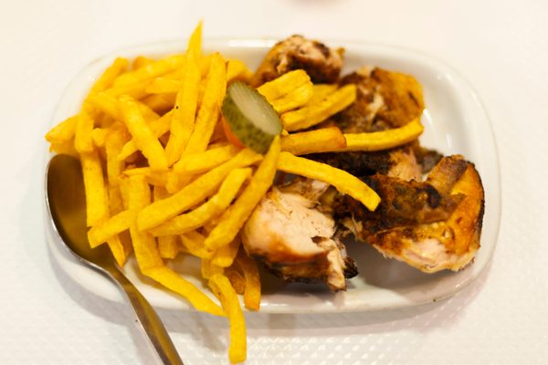 A dish of frango à cafreal, a Goan-Mozambican-Portuguese dish that’s the precursor of Nando’s peri-peri chicken, is the specialty here.