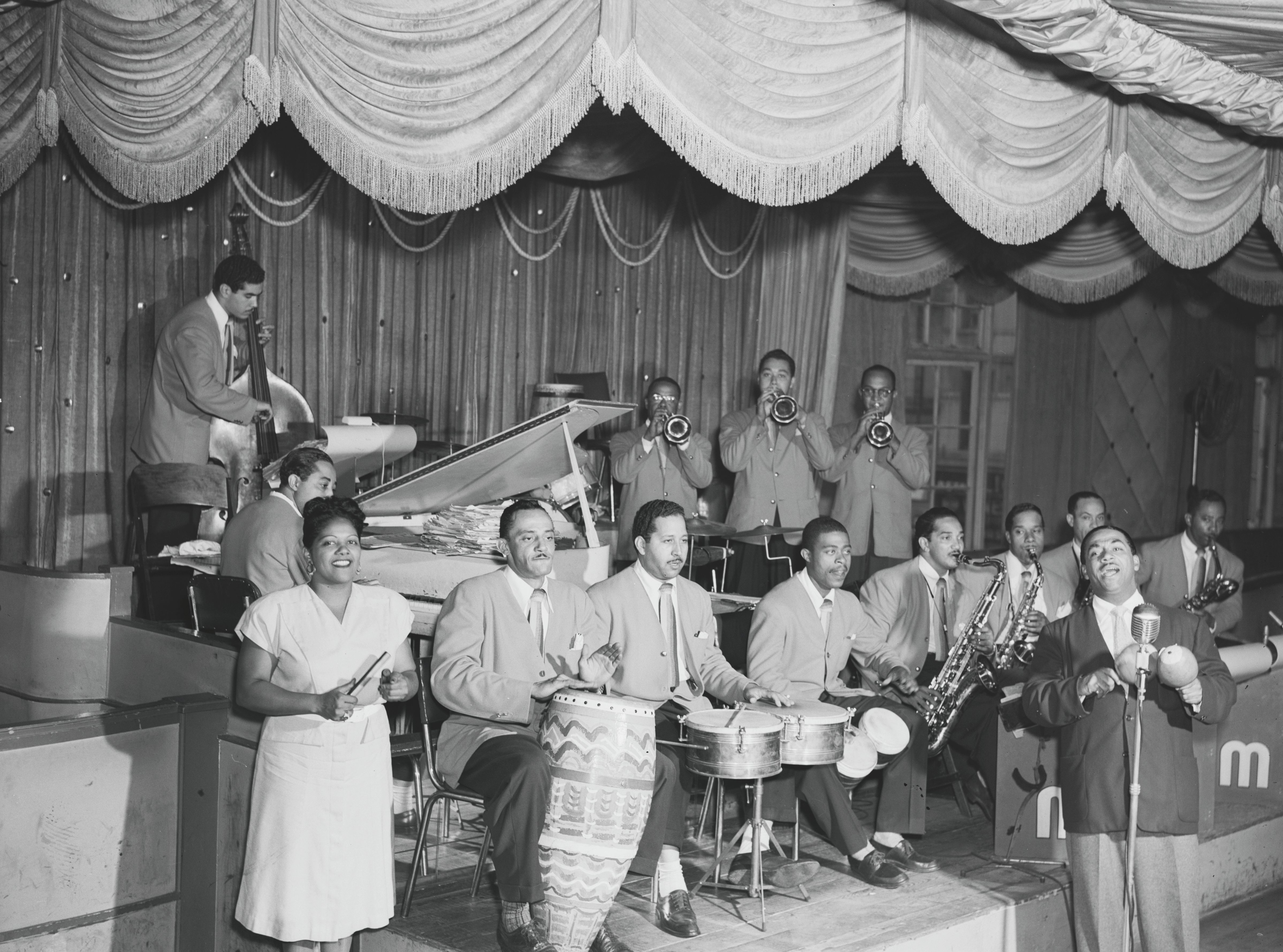 Felipa Graciela Pérez y Gutiérrez, simply known as Graciela, was the first lady of Afro-Cuban jazz. She is pictured here in New York in 1947 with the band Machito and his Afro-Cubans.